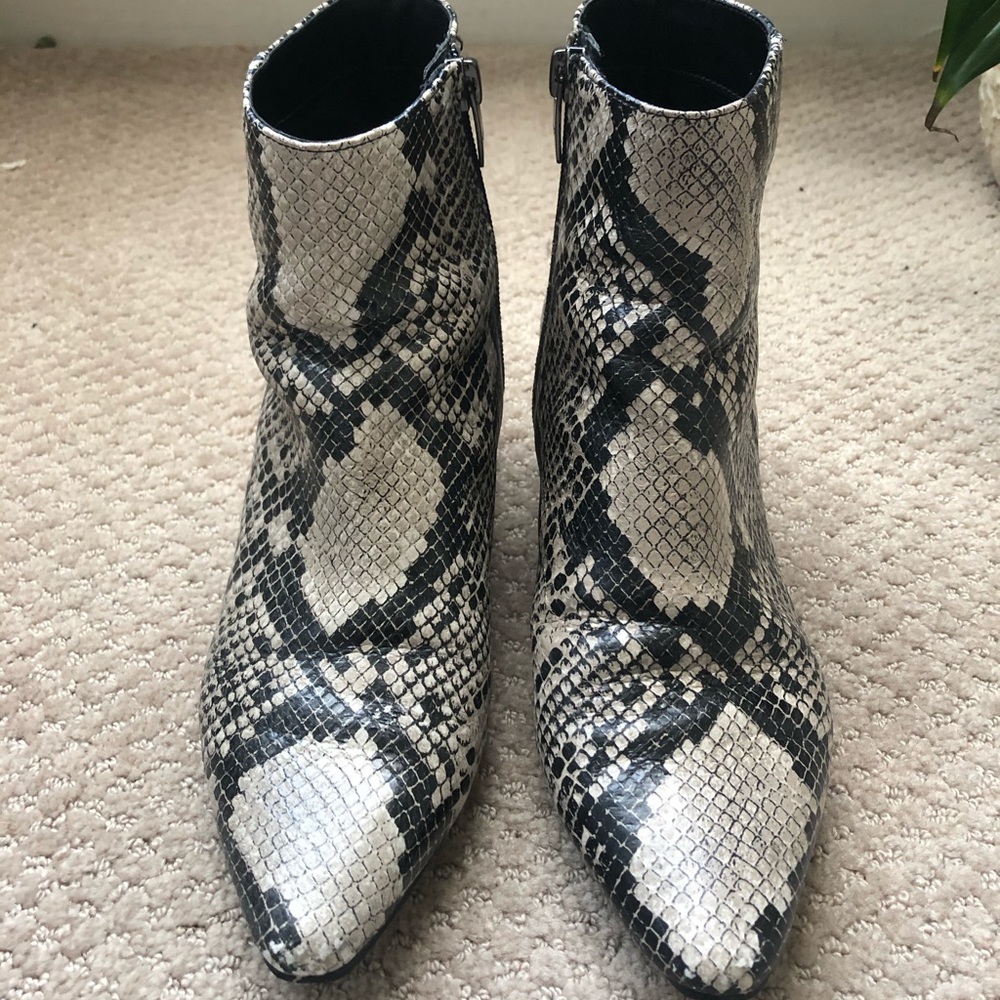 100% leather animal pattern ankle boots.
